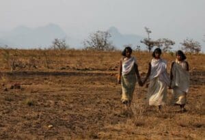 Members of the Dongria Kondh tribe walk on top of the Niyamgiri mountain near Lanjigarh